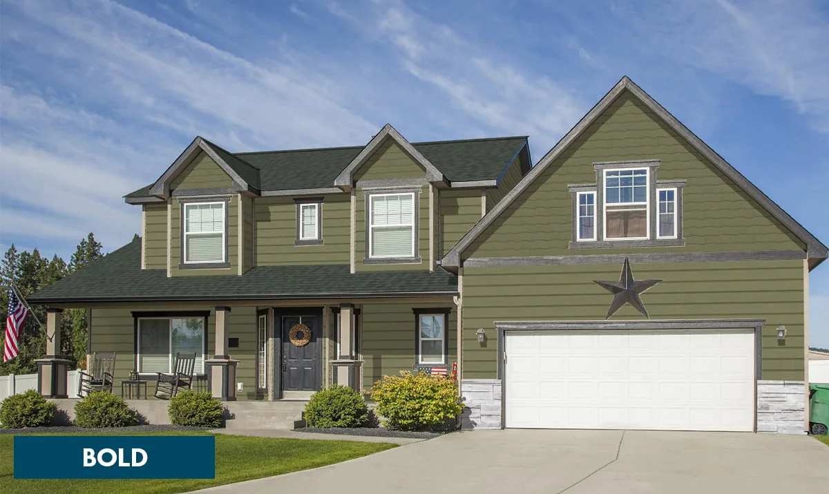 Green siding with Hunter Green roofing